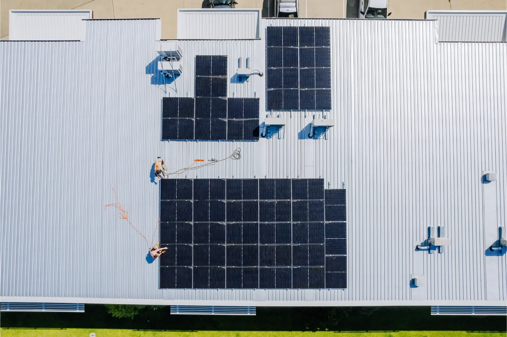 Aerial view of a Gecko solar panel array on a Coffs Coast commercial roof